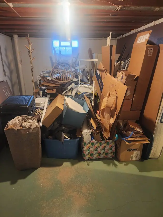 Roll-off dumpster container at job site for 4 Yard Dumpster Rental in Lexington Park